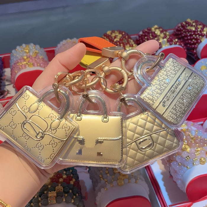 Wholesale Cute gold-colored bag keychain