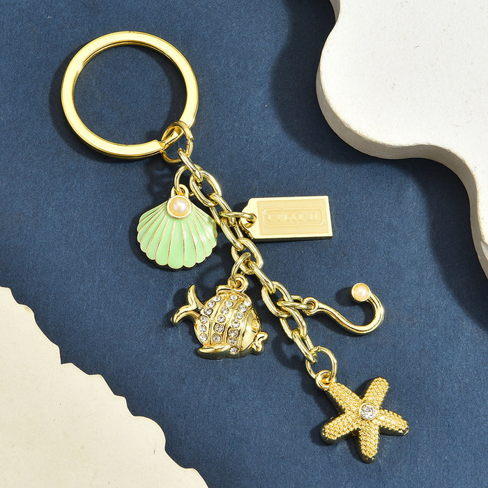 Wholesale Trendy Multi Pendant Aluminum Alloy Keychain Beach Vacation Cute Cartoon Theme Bag Charm
