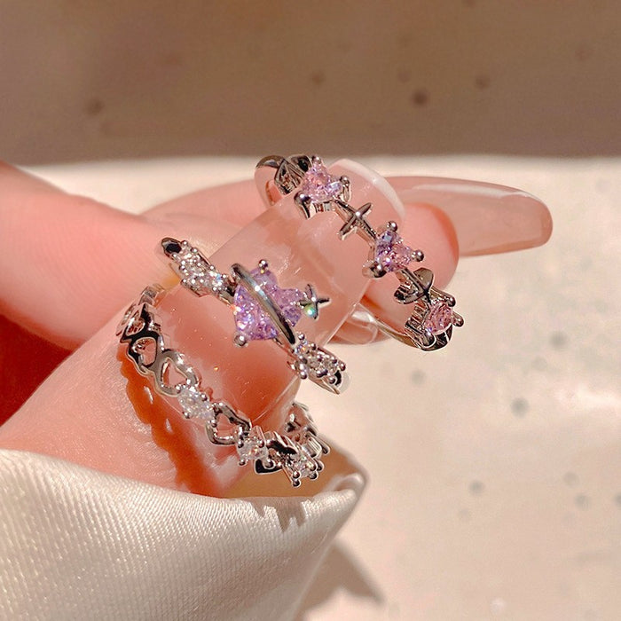 Wholesale Set of open-faced diamond-encrusted heart-shaped rings.