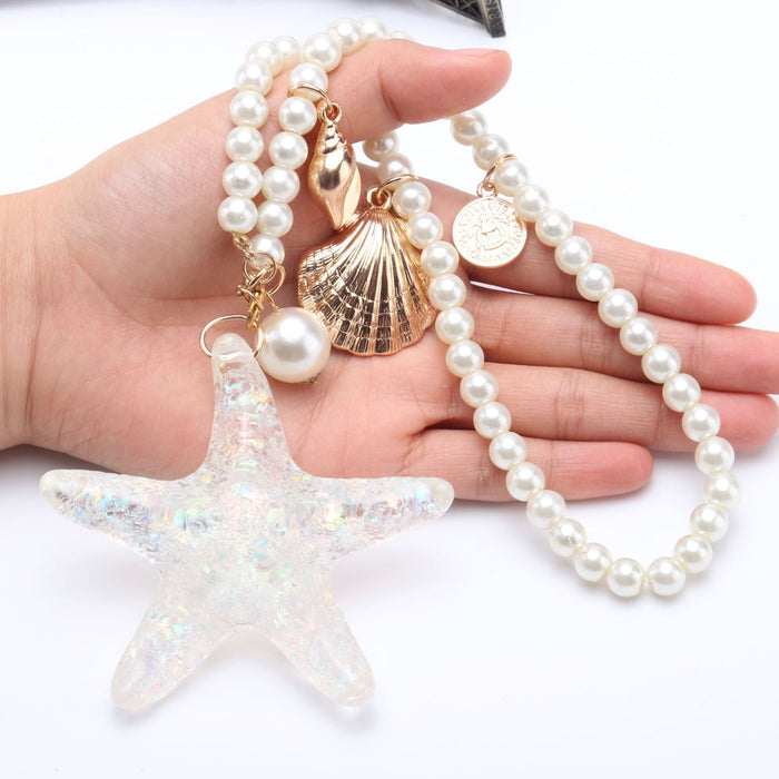 Wholesale blue crystal keychain JDC-KC-Pengl007 Keychains 鹏磊 starfish pearl chain OPP bag Wholesale Jewelry JoyasDeChina Joyas De China