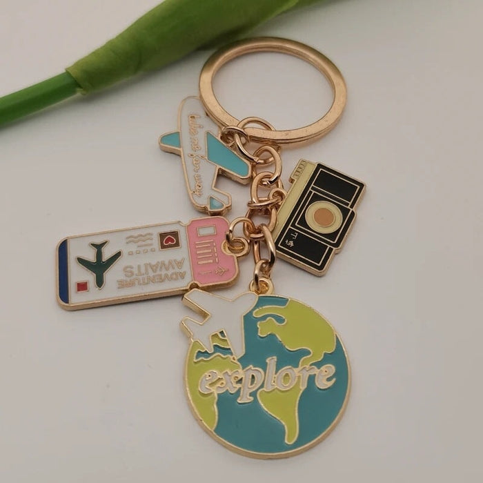Wholesale cartoon aircraft camera world map air ticket combination alloy keychain jewelry Keychains JoyasDeChina Wholesale Jewelry JoyasDeChina Joyas De China
