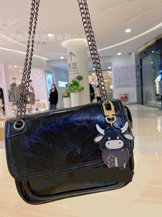 Wholesale Cartoon Classic Old Flower Cow Keychain Toy Bag Pendant Female Cute Male Couple Backpack Decorative Accessories Keychains JoyasDeChina Wholesale Jewelry JoyasDeChina Joyas De China