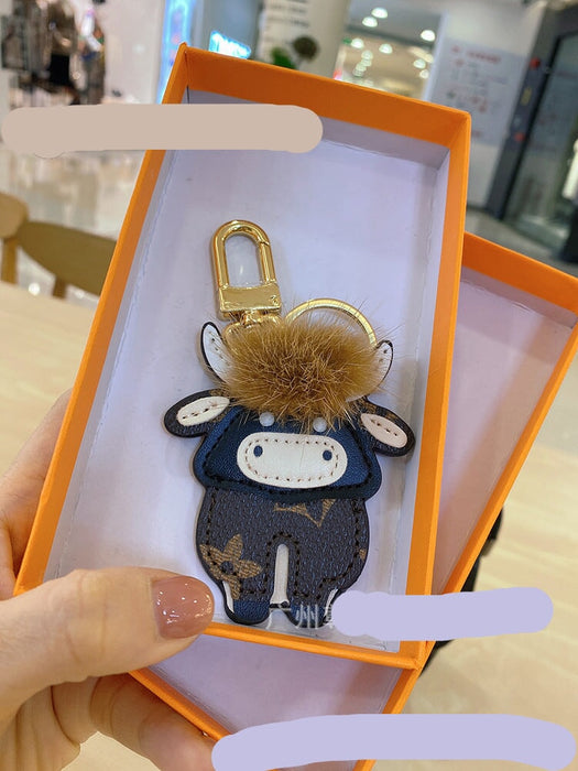 Wholesale Cartoon Classic Old Flower Cow Keychain Toy Bag Pendant Female Cute Male Couple Backpack Decorative Accessories Keychains JoyasDeChina Mink hair bullish A 0006688999 Wholesale Jewelry JoyasDeChina Joyas De China