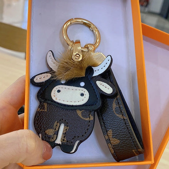 Wholesale Cartoon Classic Old Flower Cow Keychain Toy Bag Pendant Female Cute Male Couple Backpack Decorative Accessories Keychains JoyasDeChina Mink hair bullish C 0006688999 Wholesale Jewelry JoyasDeChina Joyas De China