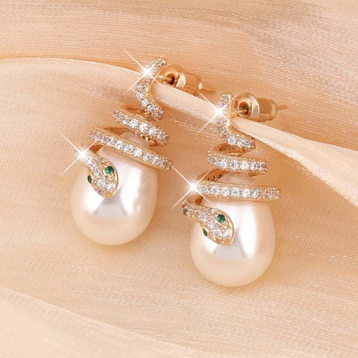 Wholesale curved serpentine pearl alloy earrings JDC-ES-Jiaow003 Earrings 娇婉 golden Wholesale Jewelry JoyasDeChina Joyas De China