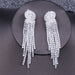 Wholesale long tassel ear clip JDC-ES-Sideng023 Earrings 思登 Wholesale Jewelry JoyasDeChina Joyas De China