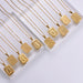 Wholesale yellow stainless steel gold-plated letter necklace JDC-NE-Aimi015 Necklaces 爱米萝 Wholesale Jewelry JoyasDeChina Joyas De China