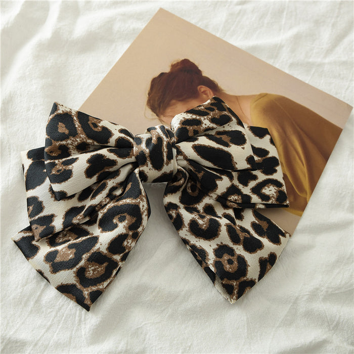 Jewelry WholesaleWholesale Leopard Print Bow Surface Fabric Spring Hair Clip JDC-HC-ST003 Hair Clips 三态 %variant_option1% %variant_option2% %variant_option3%  Factory Price JoyasDeChina Joyas De China