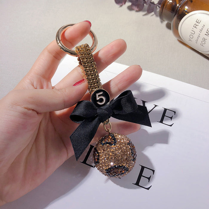 Jewelry WholesaleWholesale leopard print full diamond ball bow keychain JDC-KC-LX048 Keychains 恋希 %variant_option1% %variant_option2% %variant_option3%  Factory Price JoyasDeChina Joyas De China