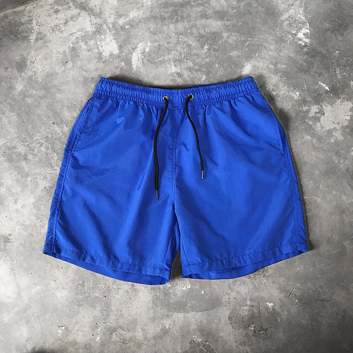 Wholesale men's beach shorts five points shorts loose waterproof surf swimming trunks JDC-SW-Chengj001