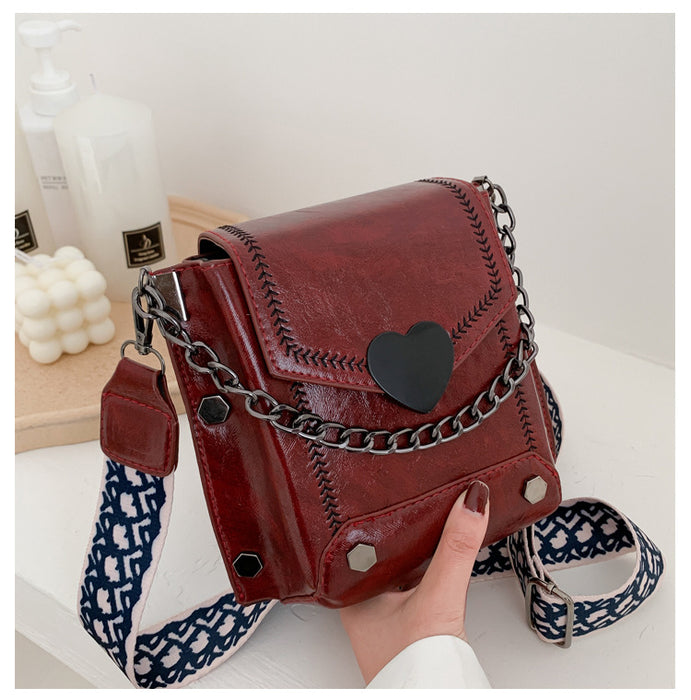 Jewelry WholesaleWholesale solid color love heart wide shoulder cross shoulder shoulder small square bag JDC-SD-Ruic002 Shoulder Bags 芮成 %variant_option1% %variant_option2% %variant_option3%  Factory Price JoyasDeChina Joyas De China