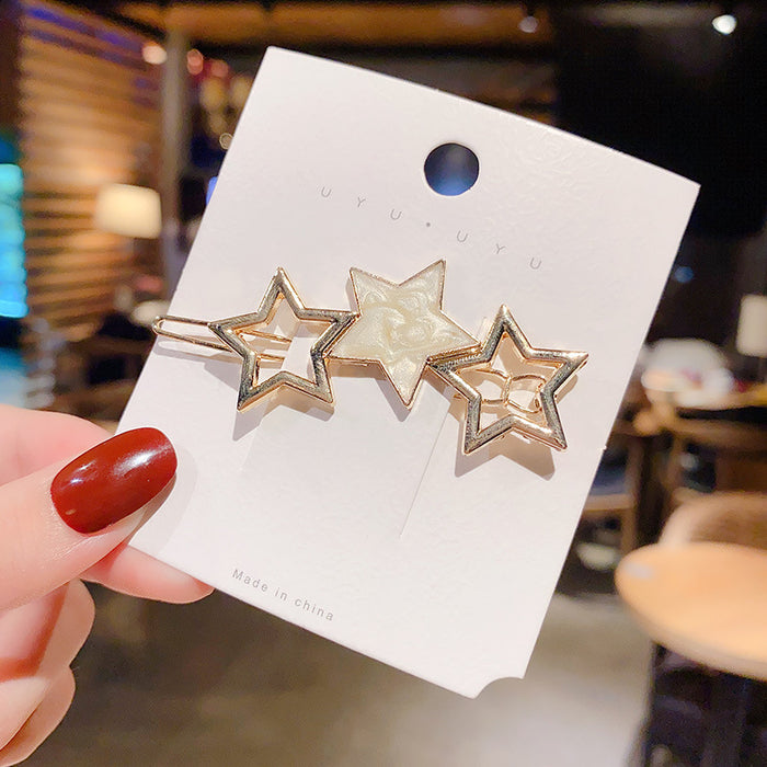 Wholesale small fresh drop oil star geometric fashion simple hair clip JDC-HC-Hankou003