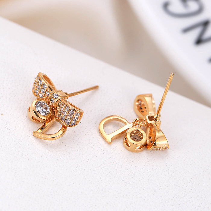 Jewelry WholesaleWholesale metal geometric bow letter stud earrings JDC-ES-Dingy007 Earrings 鼎煜 %variant_option1% %variant_option2% %variant_option3%  Factory Price JoyasDeChina Joyas De China