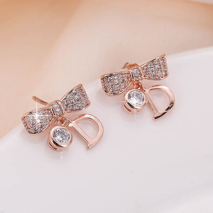 Jewelry WholesaleWholesale metal geometric bow letter stud earrings JDC-ES-Dingy007 Earrings 鼎煜 %variant_option1% %variant_option2% %variant_option3%  Factory Price JoyasDeChina Joyas De China