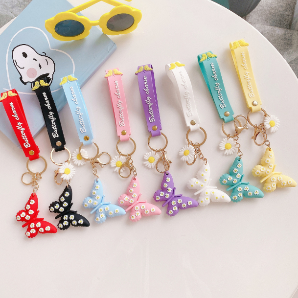 Wholesale creative cartoon silicone small daisy butterfly car key chain JDC-KC-SCheng031