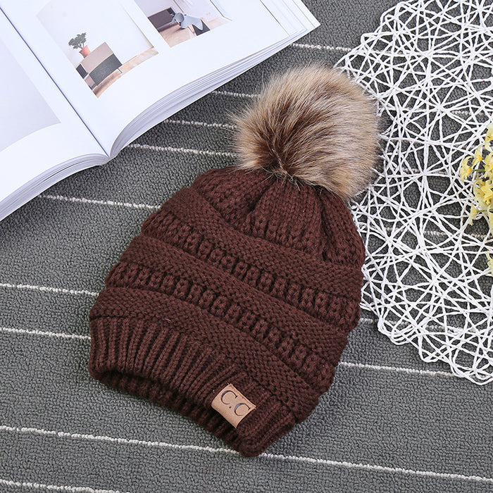 Wholesale Ponytail and Wool Ball Knitted Warm and Thick Wool Hats JDC-FH-HengYu001