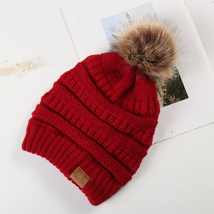 Wholesale Ponytail and Wool Ball Knitted Warm and Thick Wool Hats JDC-FH-HengYu001