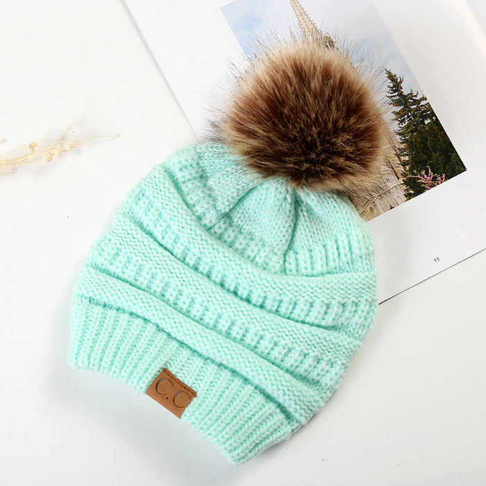 Wholesale Ponytail and Wool Ball Knitted Warm and Thick Wool Hats JDC-FH-HengYu001