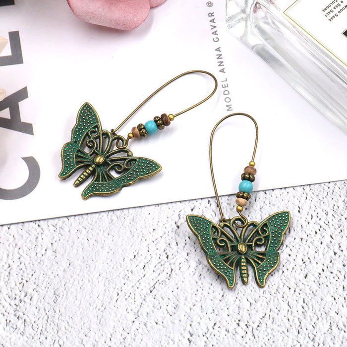 Wholesale Earrings Alloy Hollow Long Butterfly Earrings JDC-ES-Yuhong009