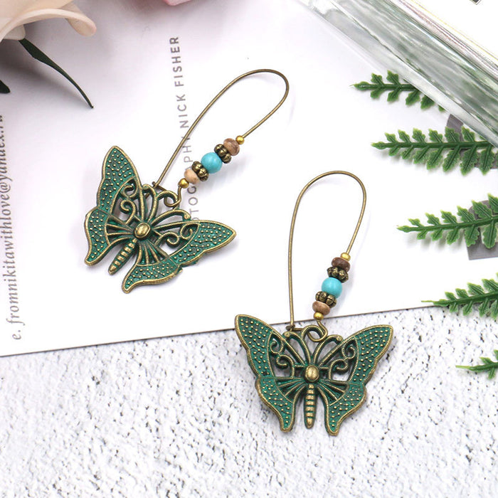 Wholesale Earrings Alloy Hollow Long Butterfly Earrings JDC-ES-Yuhong009