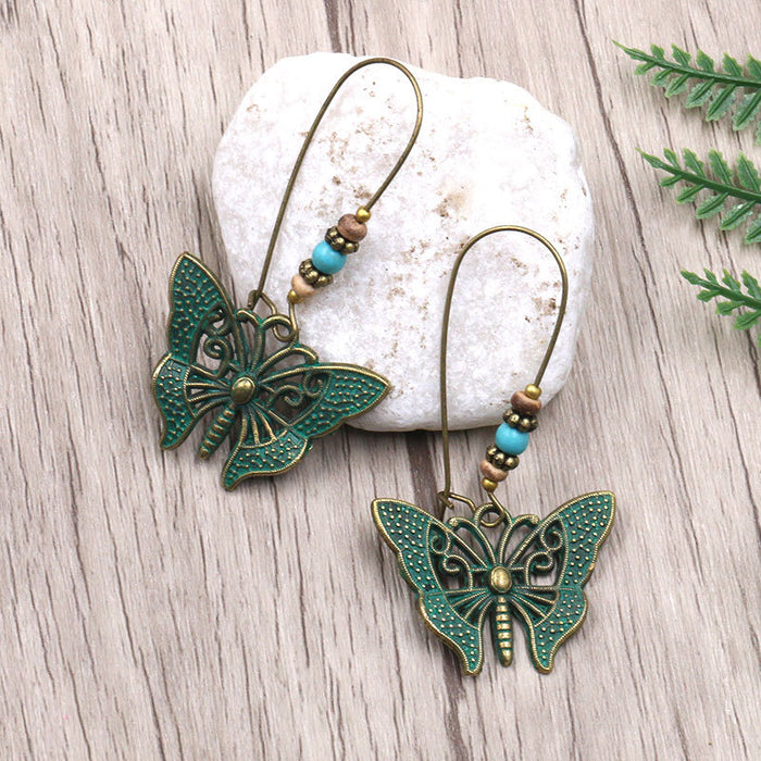 Wholesale Earrings Alloy Hollow Long Butterfly Earrings JDC-ES-Yuhong009