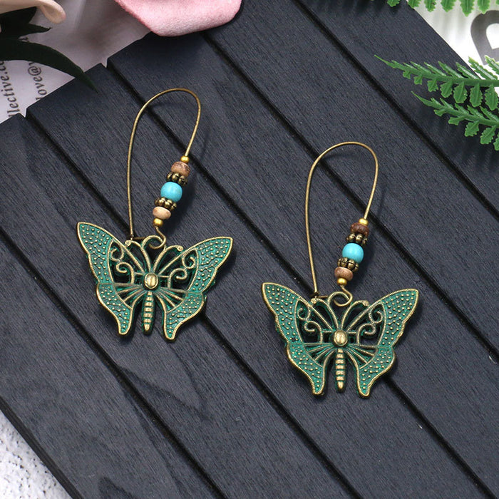 Wholesale Earrings Alloy Hollow Long Butterfly Earrings JDC-ES-Yuhong009