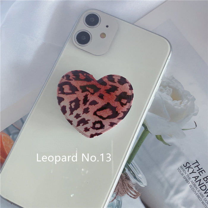 Wholesale Grips Mobile Phone Holder Leopard Print Heart Shaped Retractable Airbag Holder MOQ≥2 JDC-PS-weijiu009