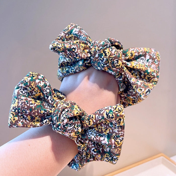 Wholesale retro style temperament floral bow large intestine ring JDC-HS-HuaJ007