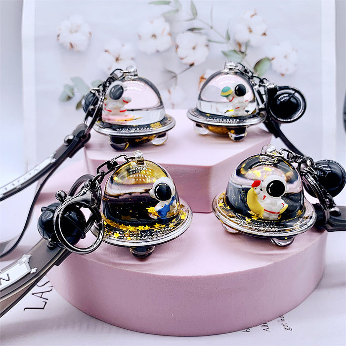 Wholesale Keychains For Backpacks personality black gold dream astronaut spaceship into oil keychain MOQ≥2 JDC-KC-DMF012