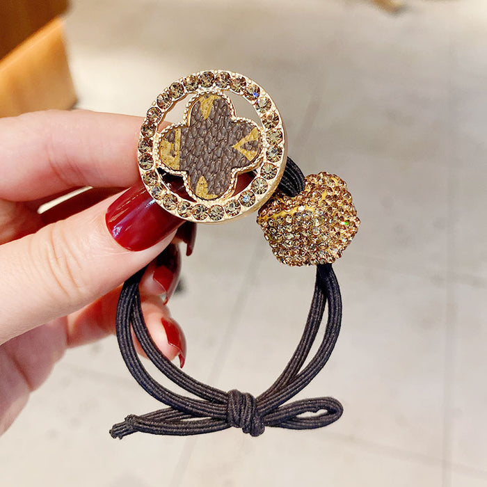 Jewelry WholesaleWholesale vintage vintage four-leaf flower set diamond hair card leather band MOQ≥2 JDC-HS-ShengL002 Hair Scrunchies 晟隆 %variant_option1% %variant_option2% %variant_option3%  Factory Price JoyasDeChina Joyas De China