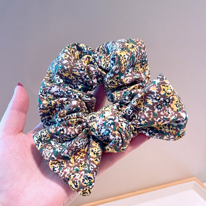 Wholesale retro style temperament floral bow large intestine ring JDC-HS-HuaJ007