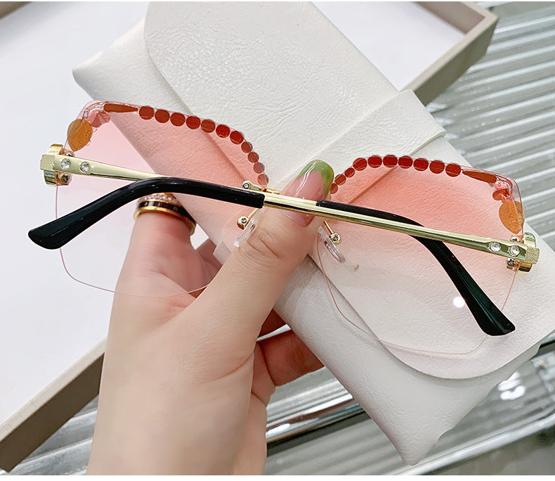 Wholesale rimless cut edge women's diamond sunglasses JDC-SG-ZhanH001