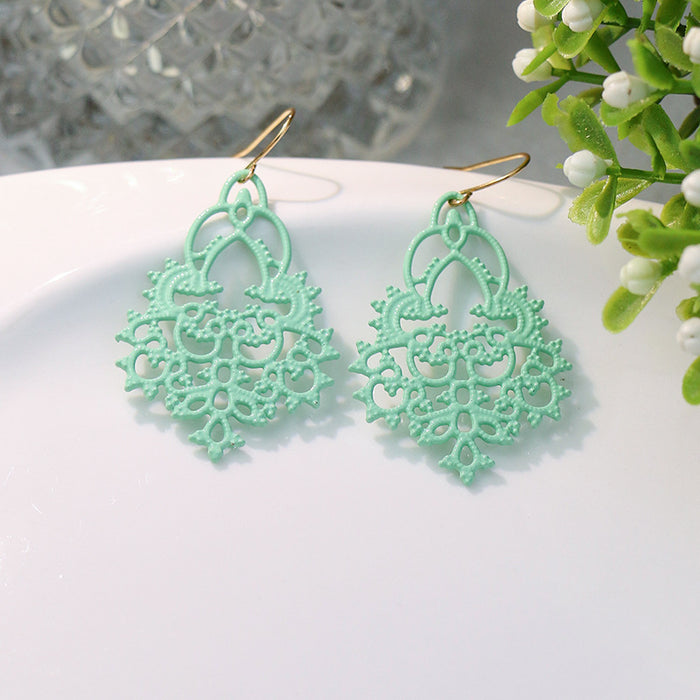 Wholesale Earrings Alloy Macaron Snowflake Hollow Out JDC-ES-momo007