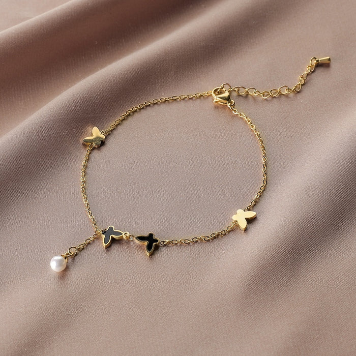 Wholesale temperament light luxury wind drop oil small butterfly pearl bracelet JDC-BT-WeiX004