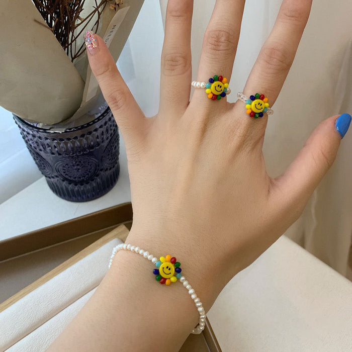 Jewelry WholesaleWholesale smiley face stretch colorful sunflower crystal pearl rice bead ring bracelet JDC-BT-LiX005 Bracelet 利兴 %variant_option1% %variant_option2% %variant_option3%  Factory Price JoyasDeChina Joyas De China