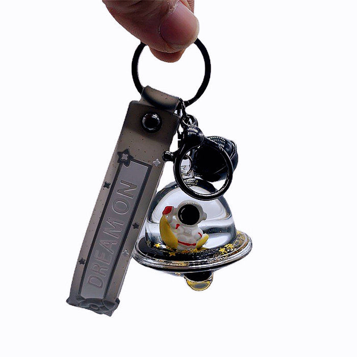 Wholesale Keychains For Backpacks personality black gold dream astronaut spaceship into oil keychain MOQ≥2 JDC-KC-DMF012