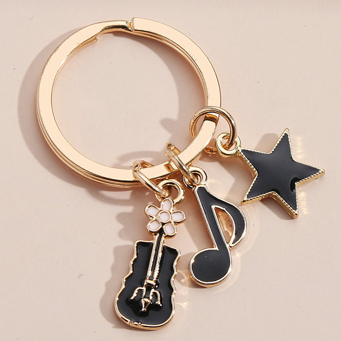 Wholesale violin note keyboard headphone key pendant MOQ≥2 JDC-KC-XiangH010