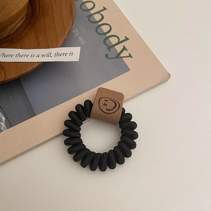 Wholesale earth color milk tea telephone wire hair ring rubber band JDC-HS-Qianq002