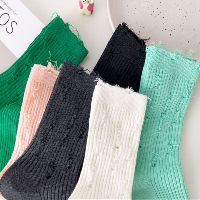 Wholesale ripped socks women's mid tube outer wear solid color trendy socks JDC-SK-XQQ001