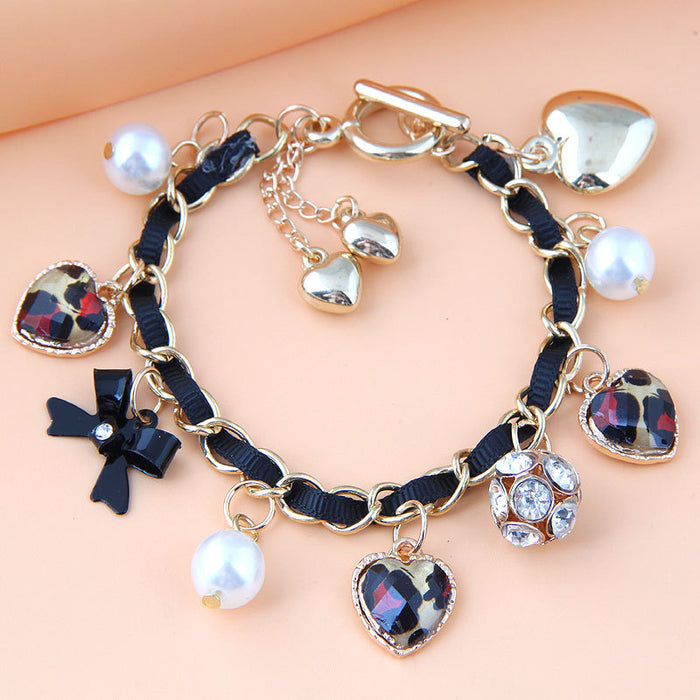 Wholesale metal versatile pearl love leopard bow multi-element personality temperament bracelet JDC-BT-WY134