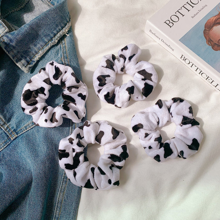 Wholesale plush cow pattern hair ring large intestine ring headdress JDC-HS-YuTing002