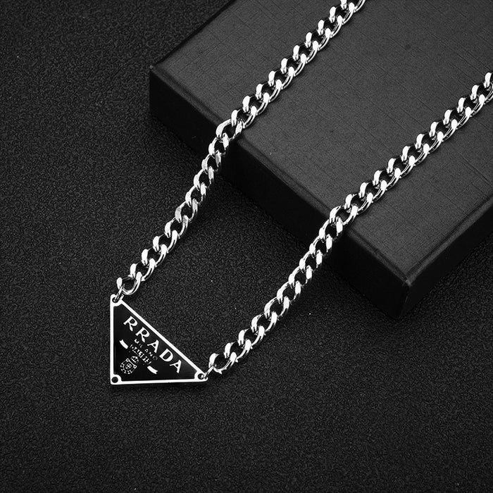 Jewelry WholesaleWholesale triangle drip oil English letter titanium steel necklace JDC-NE-ShiY008 Necklaces 仕缘 %variant_option1% %variant_option2% %variant_option3%  Factory Price JoyasDeChina Joyas De China