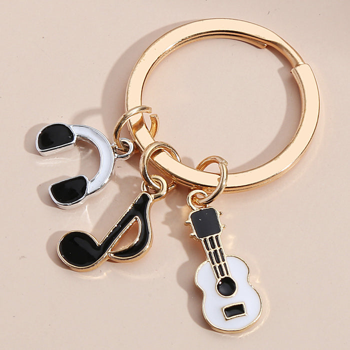 Wholesale violin note keyboard headphone key pendant MOQ≥2 JDC-KC-XiangH010