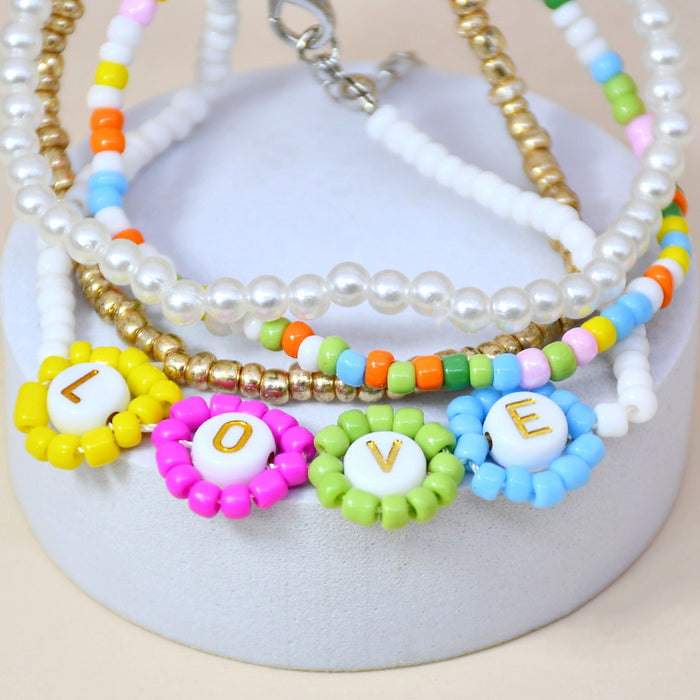 Wholesale Holiday Wind Flower LOVE Handmade Rice Beads Stretch Bracelet JDC-BT-YF015