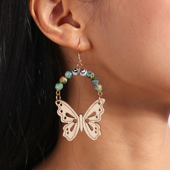 Wholesale Earrings Wooden Love Fringe Devil's Eye Hollow Carved Butterfly JDC-ES-yseng007