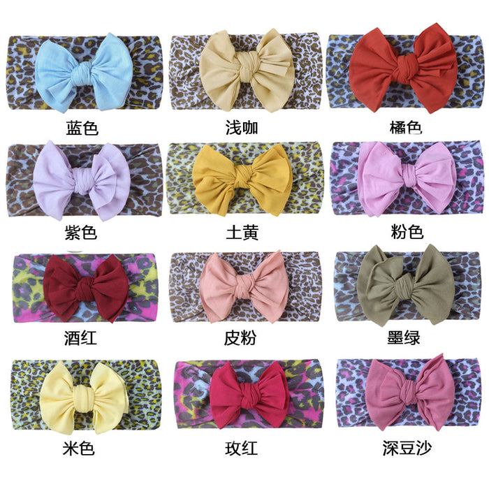 Wholesale leopard print solid color bow nylon bandana baby sweatband JDC-HD-ML030