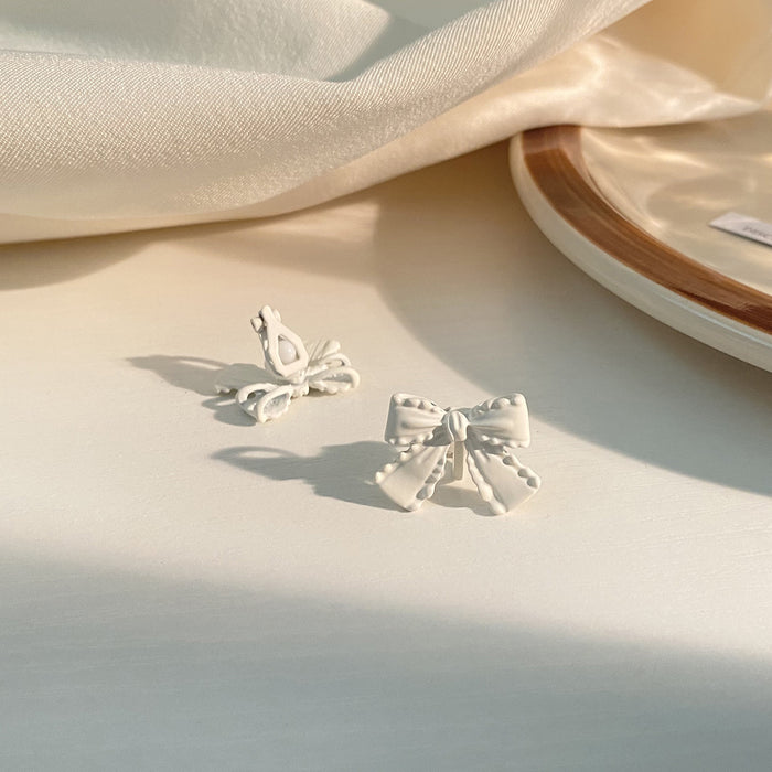 Wholesale Earrings Silver Pin Alloy Bow JDC-ES-Baolai005