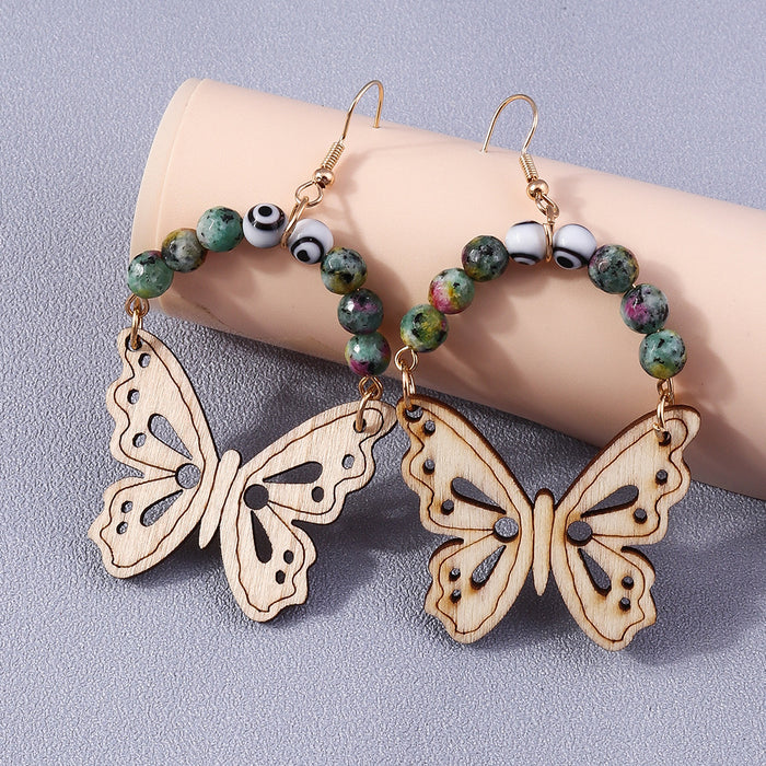 Wholesale Earrings Wooden Love Fringe Devil's Eye Hollow Carved Butterfly JDC-ES-yseng007