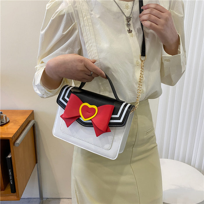 Wholesale Navy Bow Contrast Color Chain Bag JDC-SD-Henxinyu001