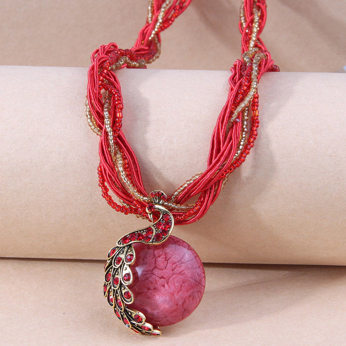 Wholesale boho style tassel retro peacock gem temperament ladies rice beads necklace sweater chain JDC-NE-WY005